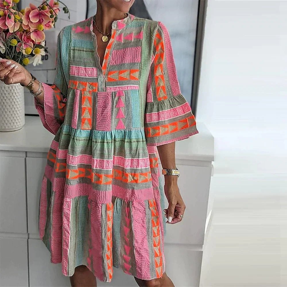 Robe Longue Mabel – Élégante avec décolleté en V et motif unique