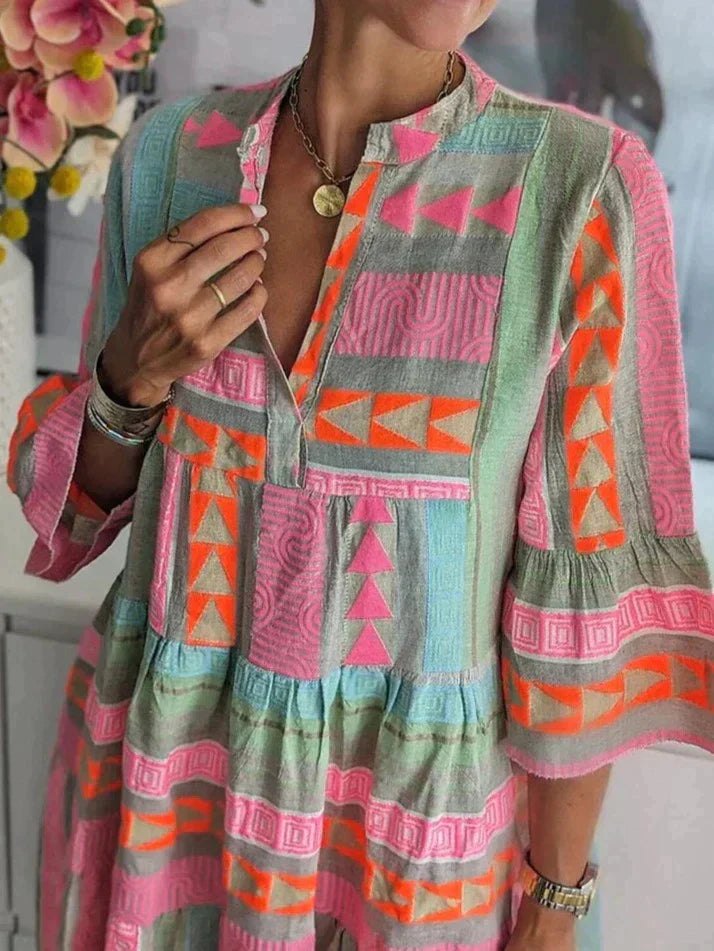 Robe Longue Mabel – Élégante avec décolleté en V et motif unique